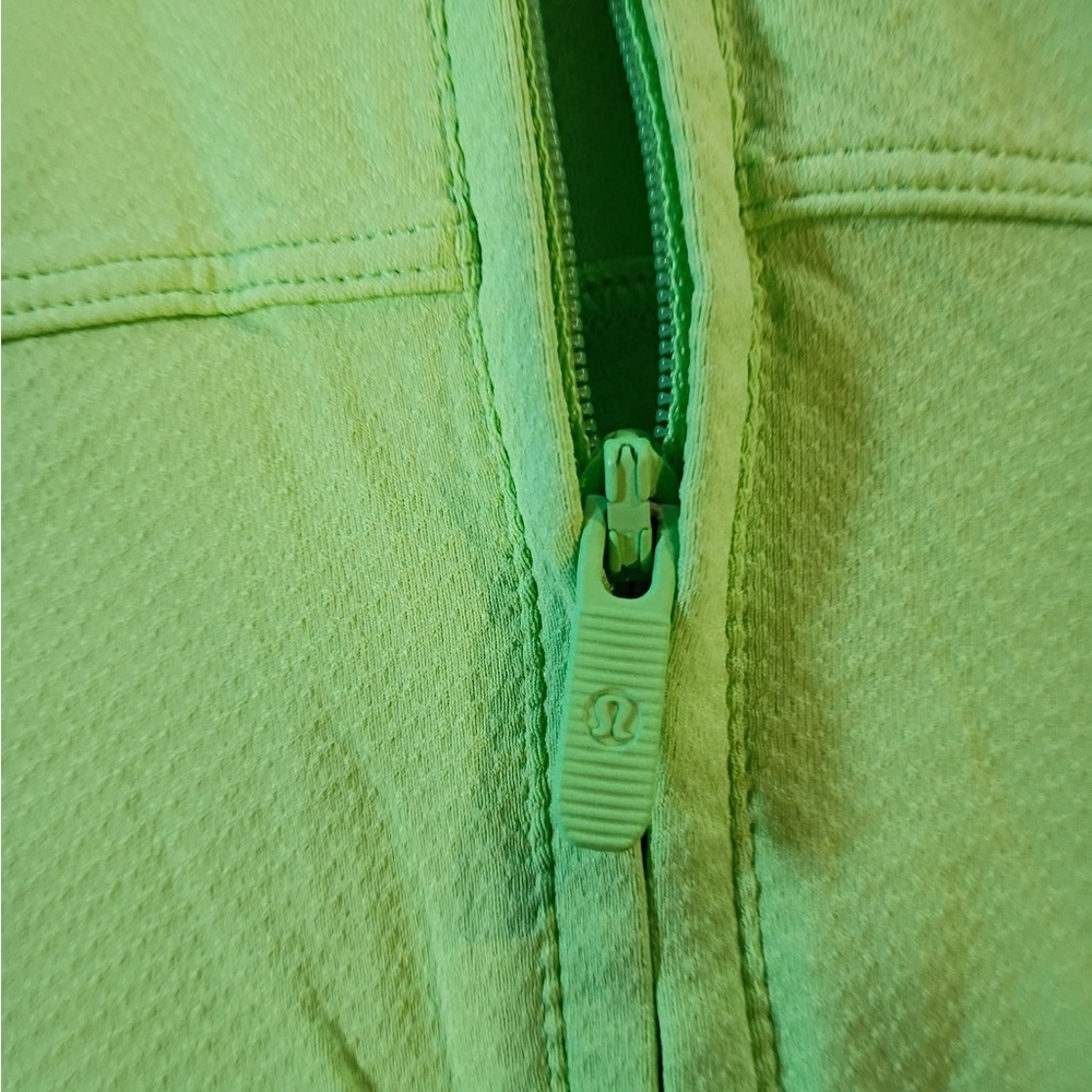 Bright neon green Lululemon sleeveless athletic top with half zip front. - Picture 7 of 7